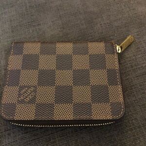 Louis Vuitton Damien zip wallet small